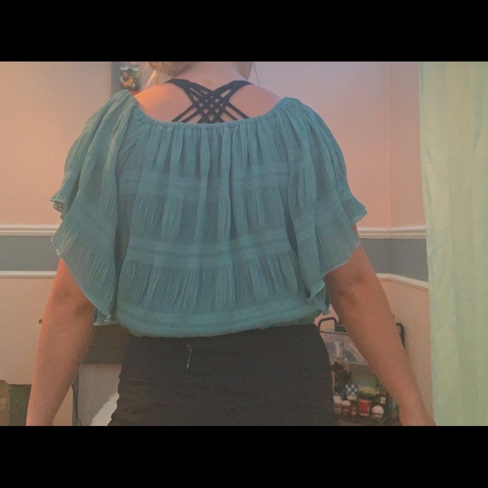 very cute off the shoulder or on shoulder top